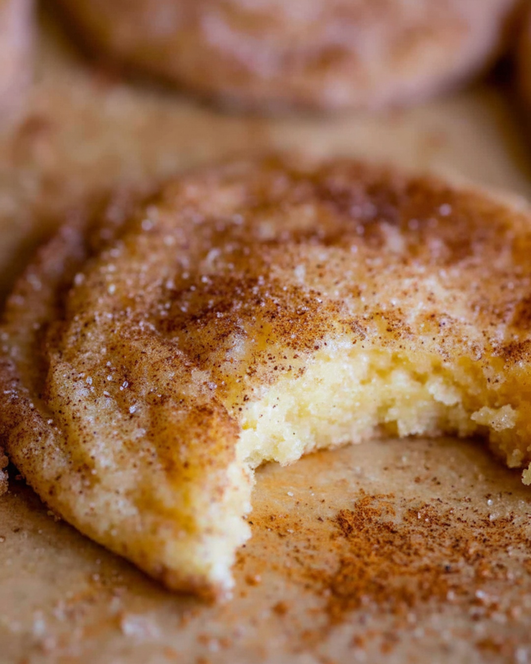 Snickerdoodle Cookies with cinnamon sugar coating on a ceramic plate