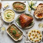 Best ham side dishes arranged on an Easter dinner table with mashed potatoes and green bean casserole